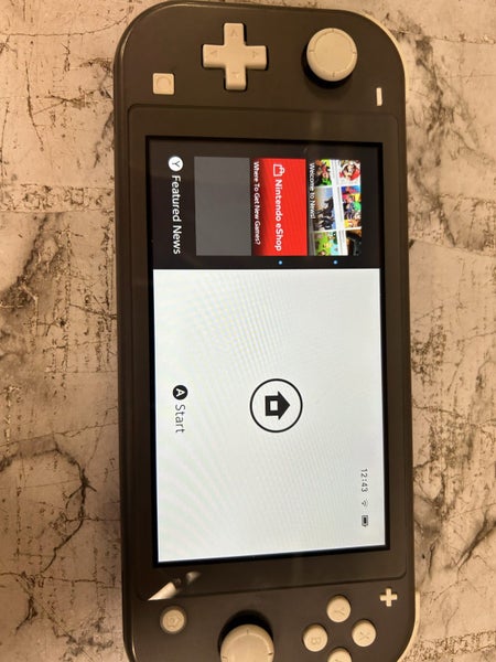 Nintendo Switch Lite Console with 128GB SD Card Carousel 4