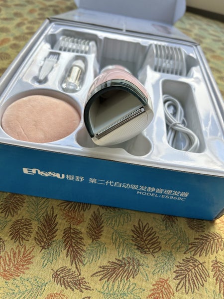 Low noise automatic inhaling hair clipper Carousel 7