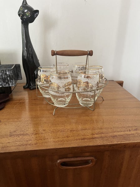 Vintage gold gilded glasses in metal stand. Carousel 2
