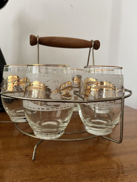 Vintage gold gilded glasses in metal stand. Carousel 1