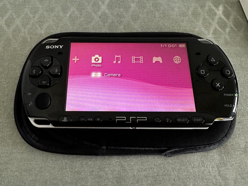 PSP 3000 – Piano Black | 64GB | Fully Set Up64352176337154111