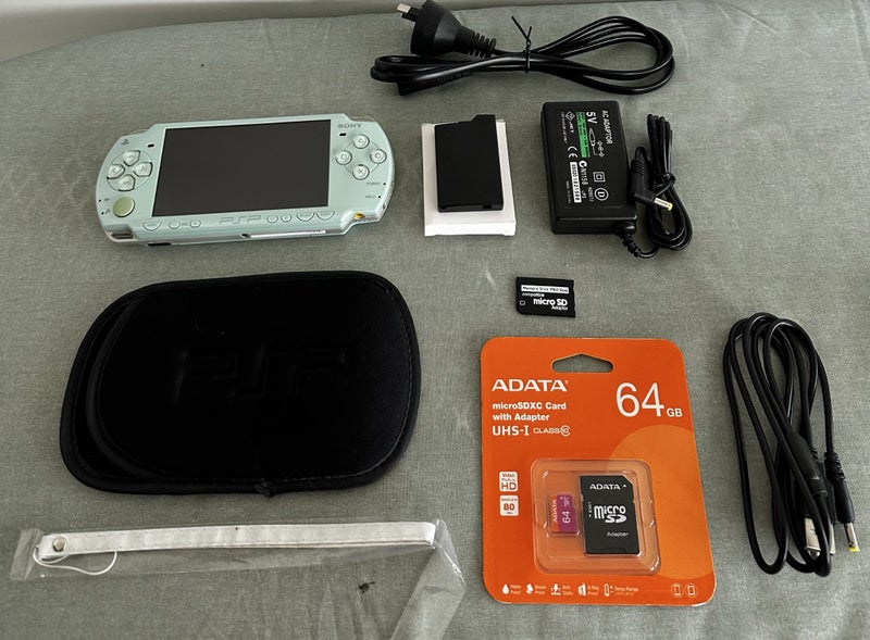 PlayStation Portable (PSP) 2000 – Mint Green | 64GB | Ready For Use64432529245185110