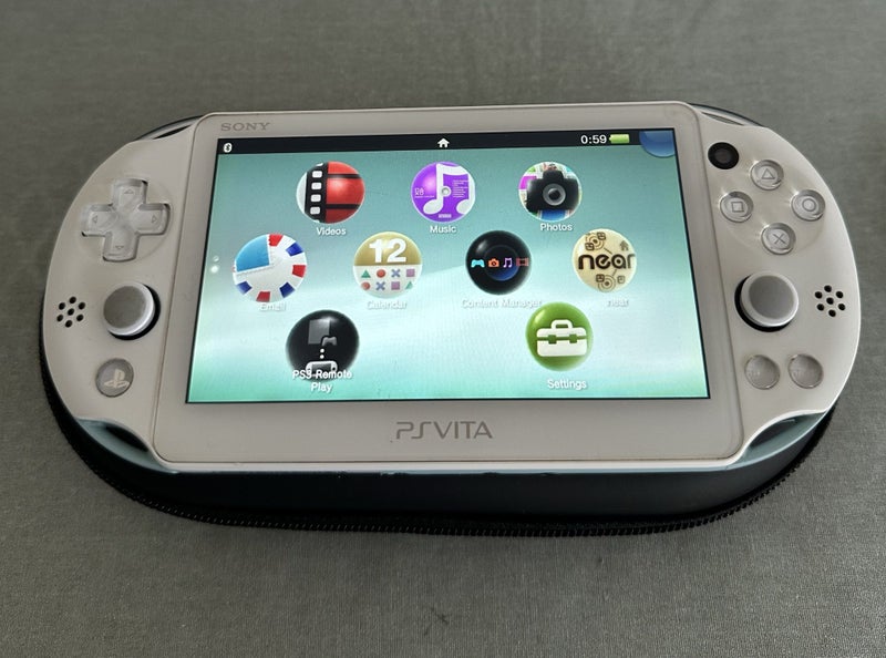 PS Vita 2000 – White / Light Blue | 64 GB | Fully Set Up64366767971715111