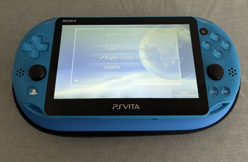PS Vita 2000 – Aqua Blue | 64 GB | Fully Set Up64366665502211111