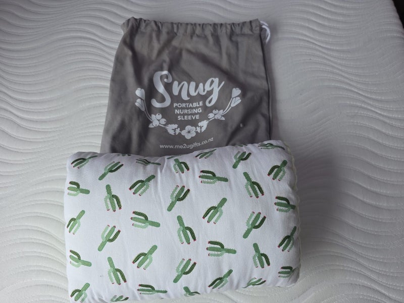 Snug portable nursing sleeve. Carousel 2