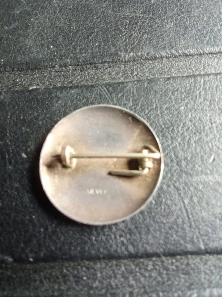 Silver pin badge. Carousel 2