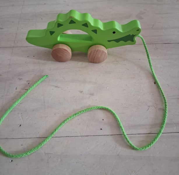 Hape baby toy wooden crocodile pull along Carousel 1