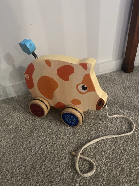 Cute wooden piggie pull along for baby. Carousel 2