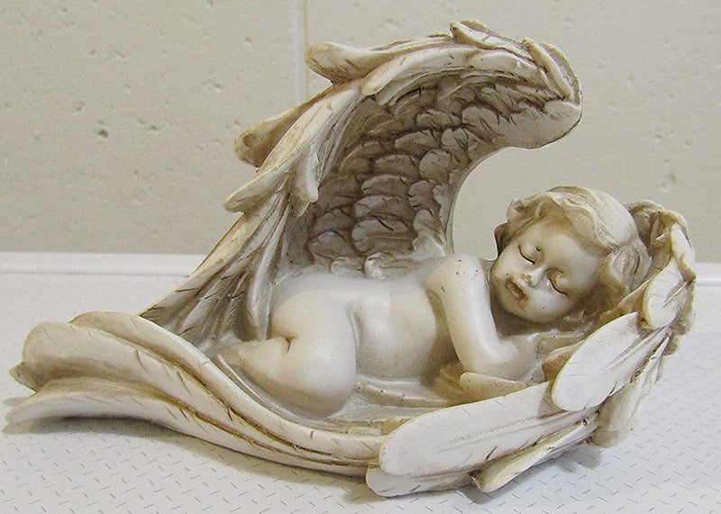 Sleeping cherub, head to right Carousel 1