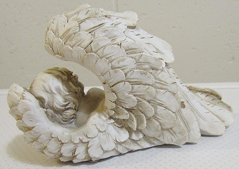 Sleeping cherub, head to right Carousel 4