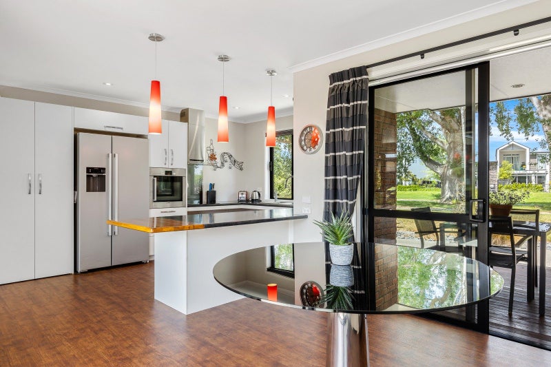 Private riverside living in popular Silverstream64428921117826112