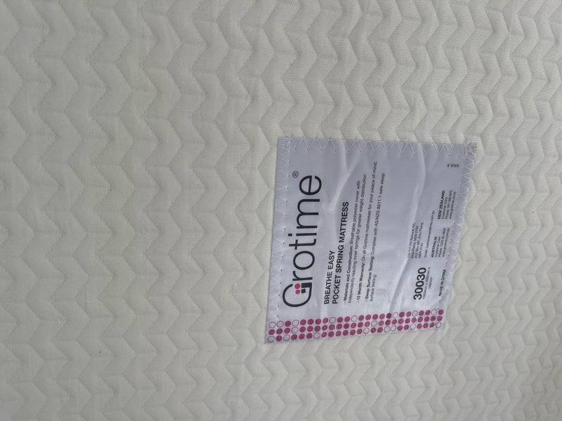 Cot and mattress - Grow time cot less than a year old64436339000835112