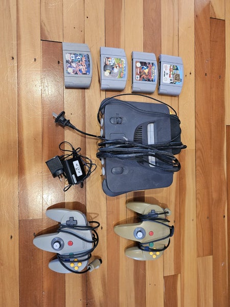 Nintendo64 + 2 x Controllers + 4 Games (Including MarioKart 64) + HDMI Converter64440389481473110