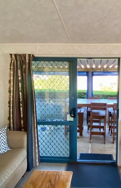 Seaside Cabin Within Clarks Beach Holiday Park Carousel 1