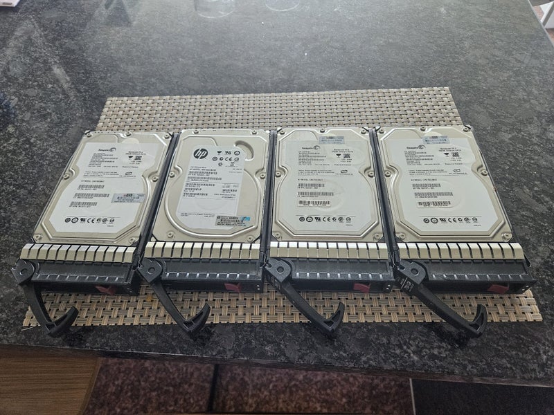 HP 5.25" Sata Drives x 4 (Including Drive Caddies) Carousel 1