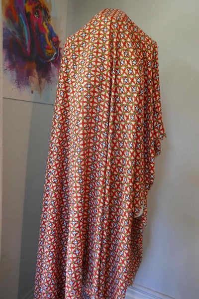 Orange -green main colours dress length Carousel 2