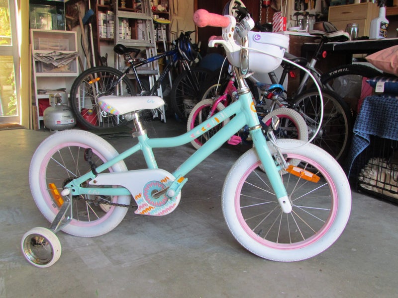 Childs bike with trainer wheels. Carousel 2