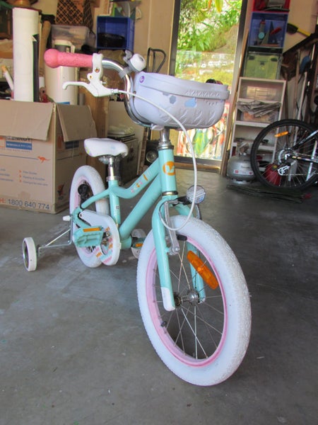 Childs bike with trainer wheels. Carousel 6