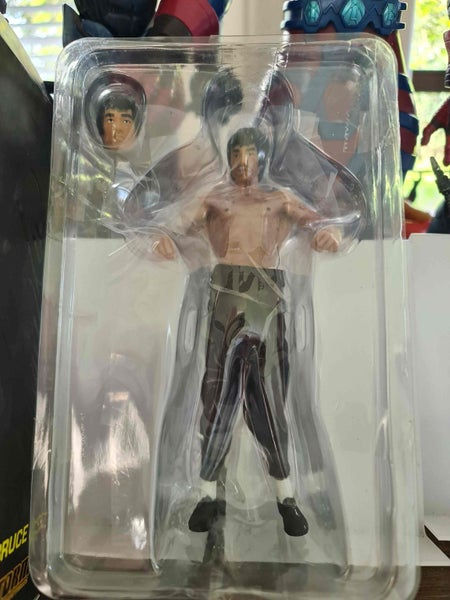 Bruce Lee Action figure plus a x factor 71 comic book64473827948930113