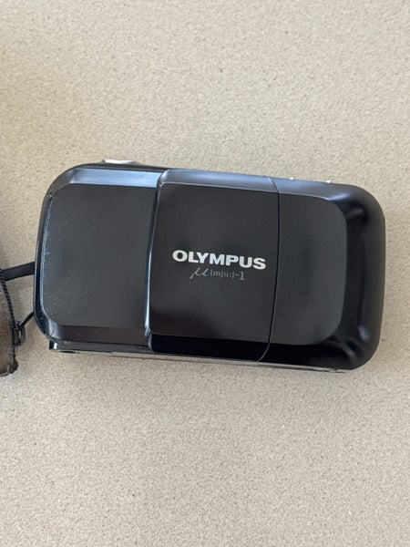 Olympus MJU-1 Carousel 1