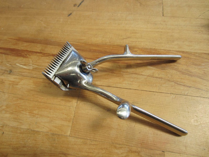 Vintage Oster 'Model H' Cutting Combs Carousel 2