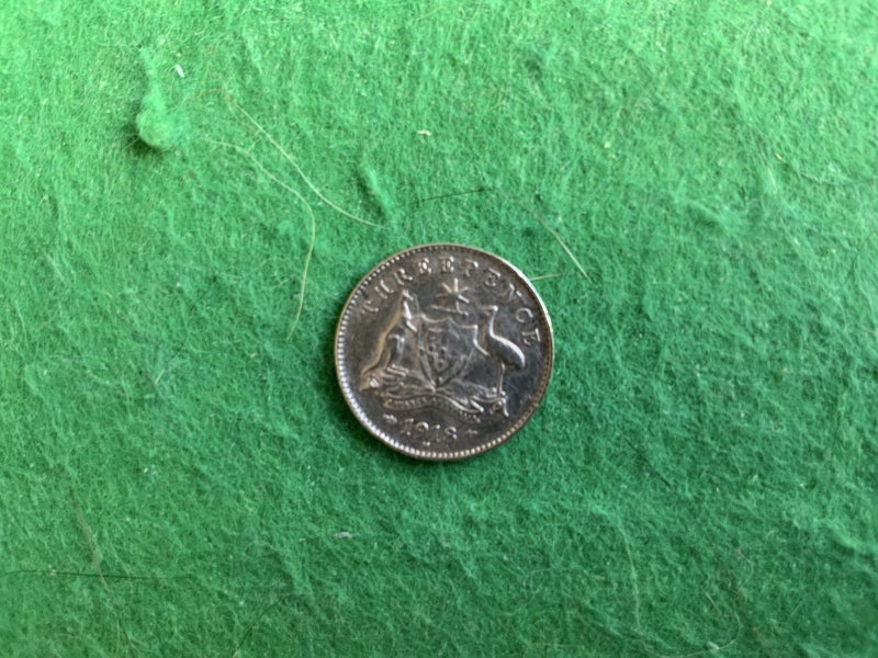 Australian 1918 Threepence coin with minting flaw on front at top Carousel 2