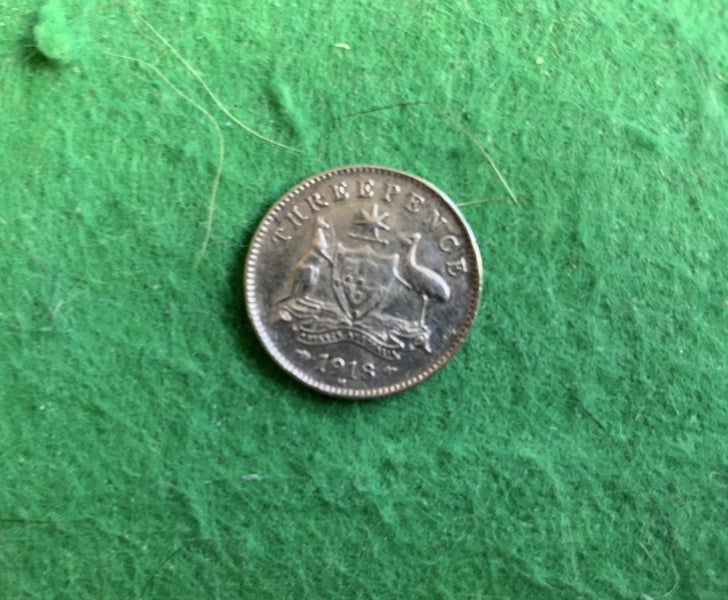 Australian 1918 Threepence coin with minting flaw on front at top Carousel 5