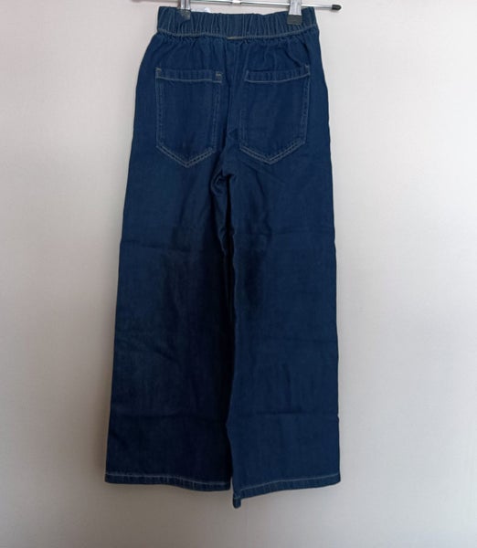 Zara Kids denim jeans with a paperbag waist and drawstring. Carousel 1