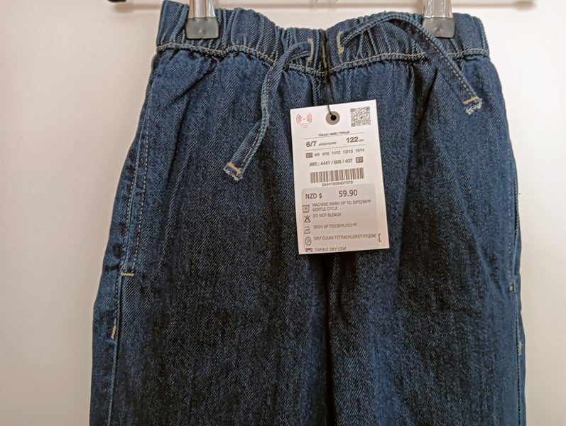 Zara Kids denim jeans with a paperbag waist and drawstring. Carousel 3