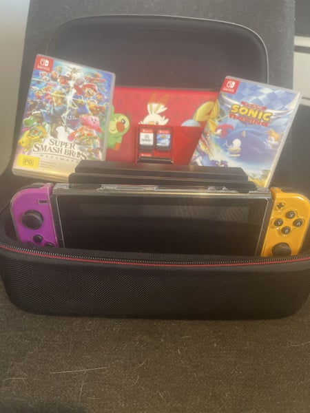 Nintendo Switch + Accessories and games Carousel 1