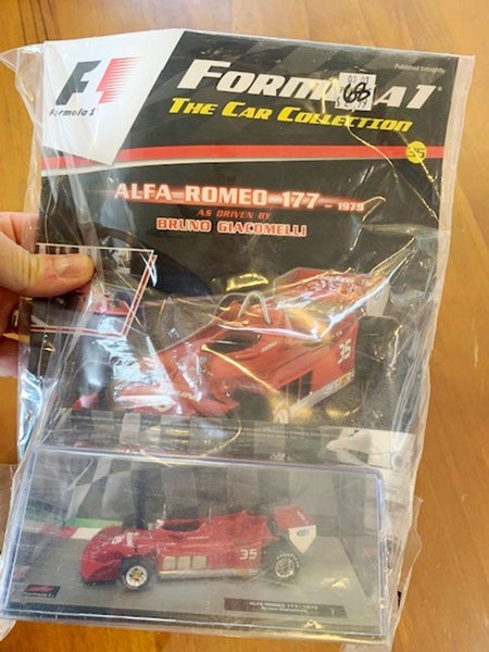 Formula A1 Unopened: Bruno Giacomelli Alfa Romeo 177 die cast car + Mag Carousel 1