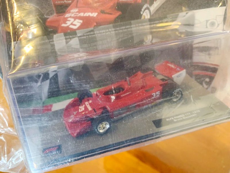 Formula A1 Unopened: Bruno Giacomelli Alfa Romeo 177 die cast car + Mag Carousel 2