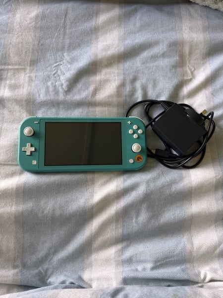 Nintendo Switch Lite ( New Horizons Edition) Carousel 1