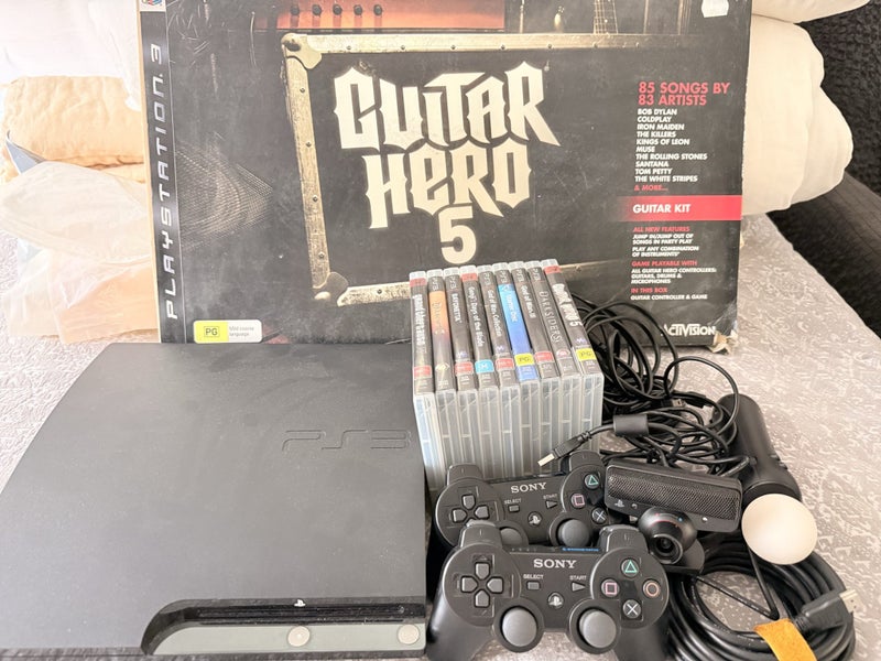 PS3 console+PS Move+guitar hero+games Carousel 1