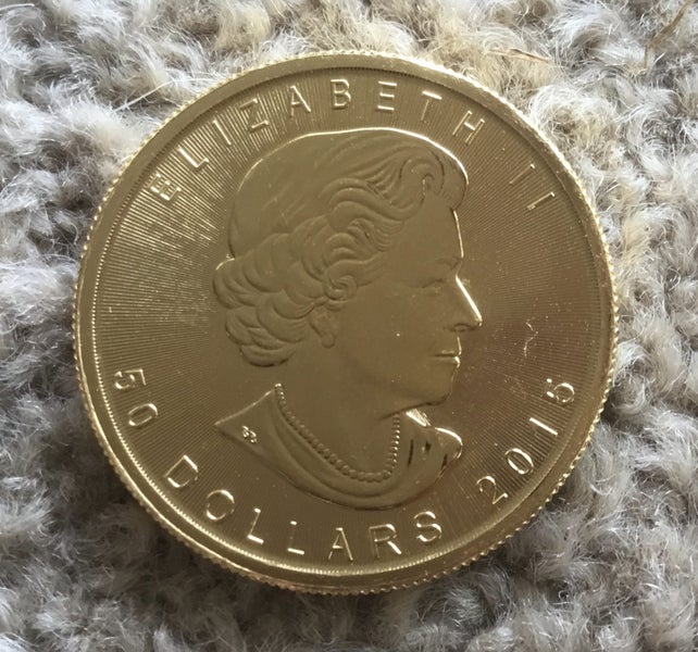 2015 1oz Canadian Gold Maple Leaf Carousel 2