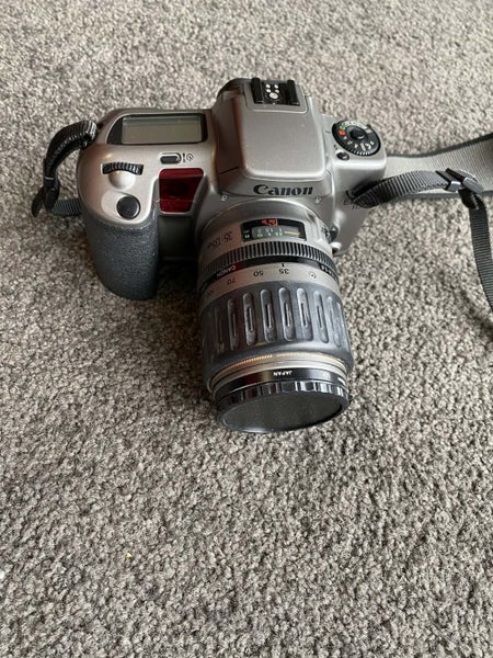 Title: Canon EOS 10 35mm SLR + 35–105mm Zoom + Grip + Bag + Manuals — Working64806899680259113