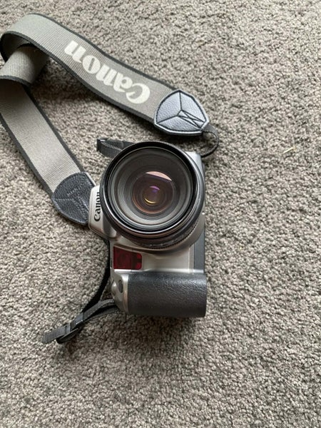 Title: Canon EOS 10 35mm SLR + 35–105mm Zoom + Grip + Bag + Manuals — Working64806899680259111