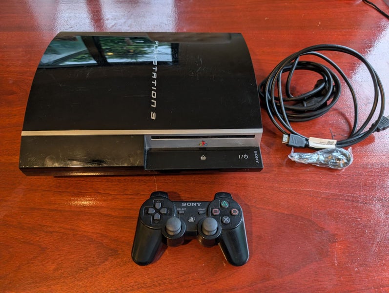 Play Station 3 Console + Controller + Game Carousel 1