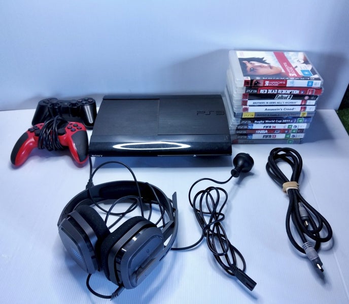 Sony PlayStation 3 console, super slim model, x11 games, x2 controllers &headset Carousel 1