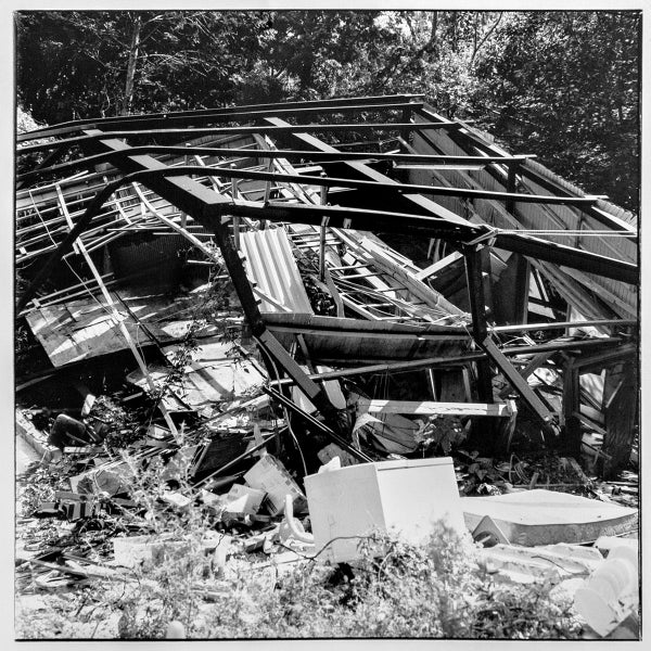 Theo Macdonald, Collapsed home, Nagasaki City. PhotoForumNZ fundraiser Carousel 1