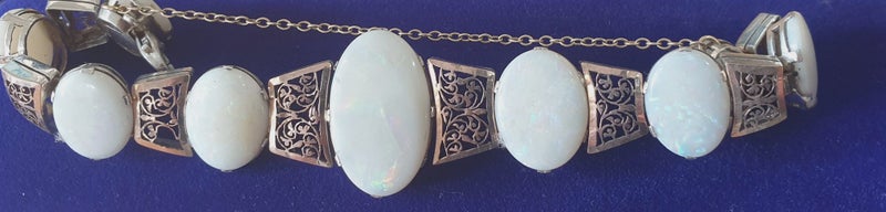 9ct Rose Gold and Opal Bracelet Carousel 1