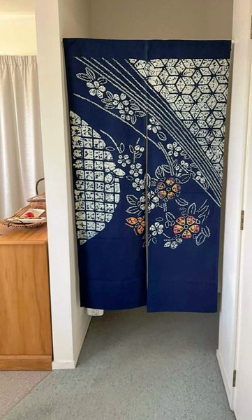 Japanese Noren, doorway curtain for privacy or decor. Mostly blue and white. Carousel 1