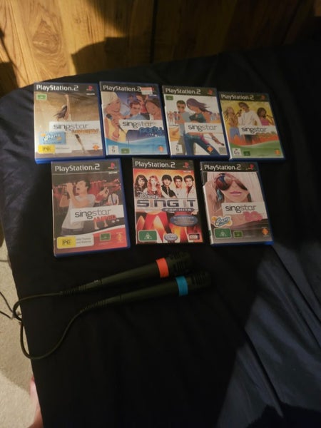 Ps2 with singstar and buzz Carousel 3