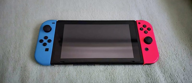 UNPATCHED/MODDABLE Nintendo Switch Original (Incl. 128Gb microSD and Dock) Carousel 1