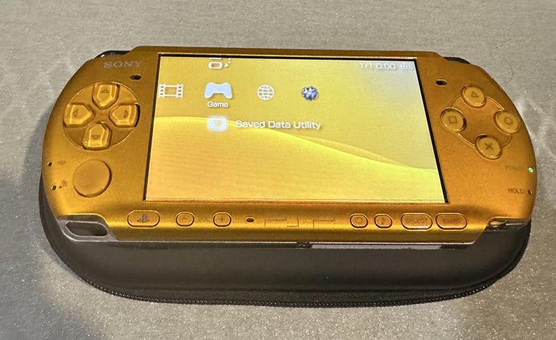 PSP 3000 – Vibrant Yellow | 64GB | Fully Set Up64611484756610111