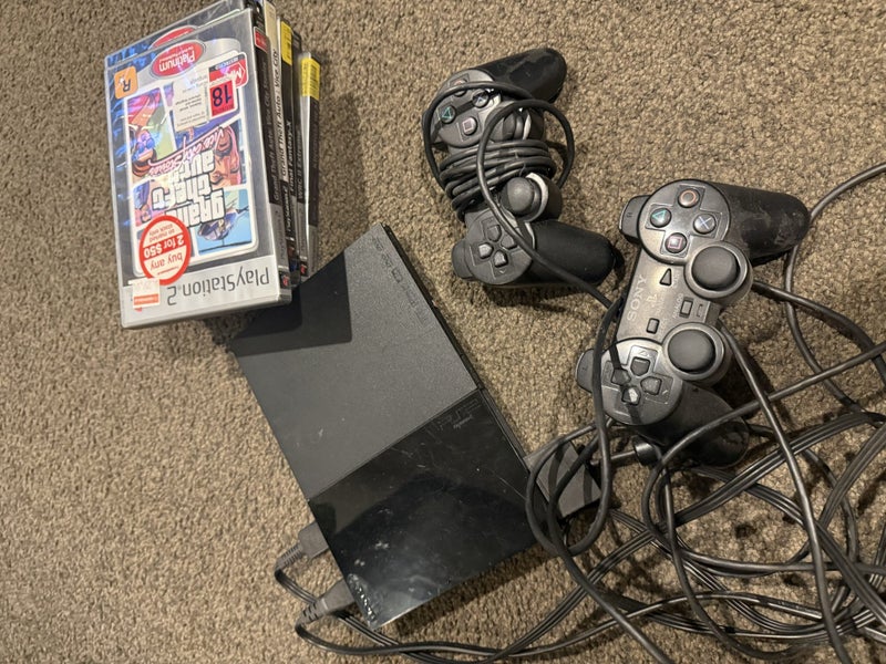 PS2 bundle - console, 2x controllers and games Carousel 1