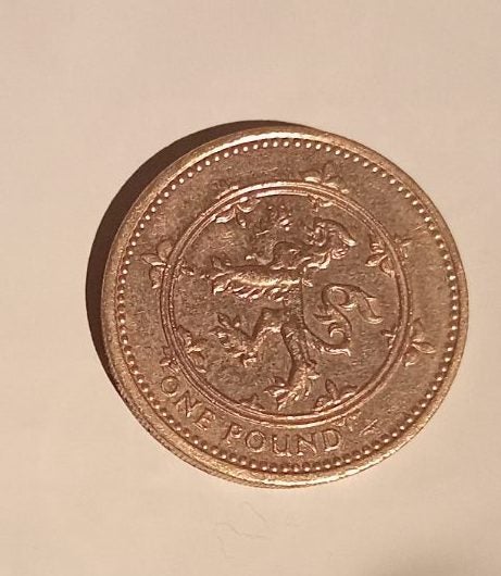 $1 reserve UK one pound 1994 inscripted coin Carousel 1