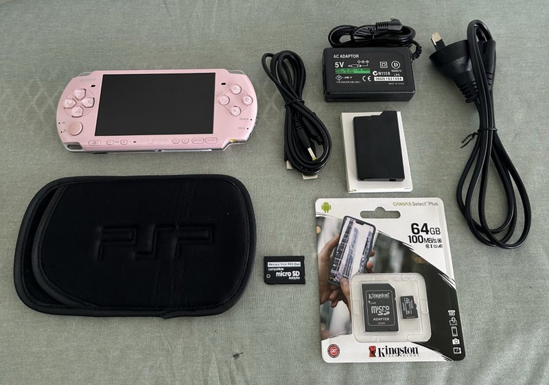 PSP 3000 – Blossom Pink | 64 GB | Fully Set Up Carousel 1