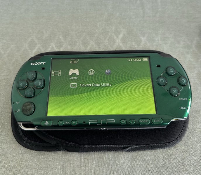 PSP 3000 – Carnival Green | 64 GB | Fully Set Up Carousel 2