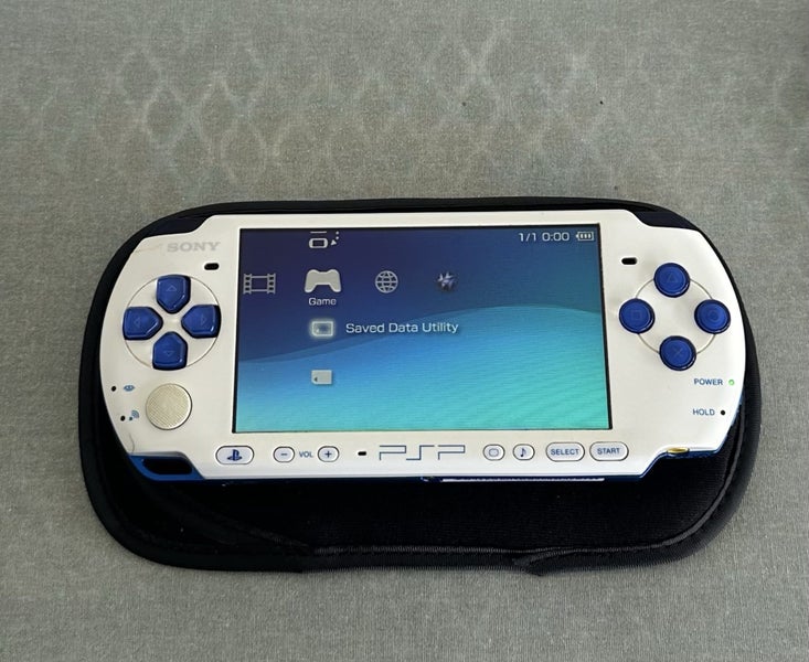 PSP 3000 – White & Blue Edition | 64GB | Fully Set Up Carousel 2